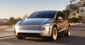 Tesla logo visible at an electric vehicle charging station in Baker, California, between Los Angeles and Las Vegas, on November 19, 2024. REUTERS/Mike Blake/File Photo – Licensing rights available for purchase.